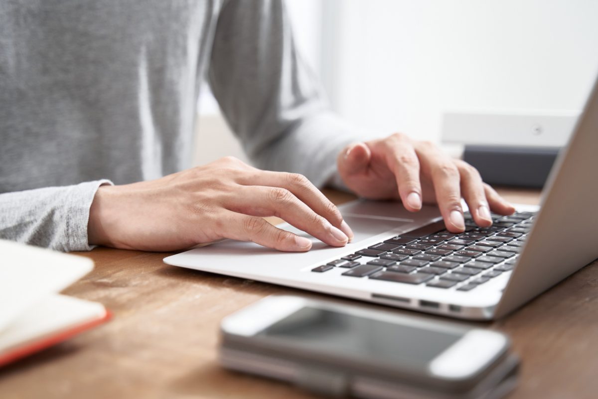 Japanese male businessman working from home in plain clothes